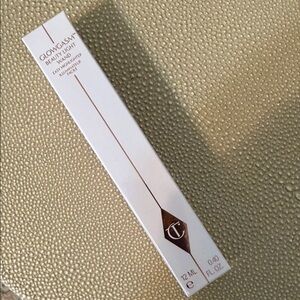 Charlotte Tilbury Glowgasm Light Wand in White and Gold